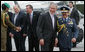 President George W. Bush walks with Bahrain's King Hamad Bin Isa Al-Khalifa at Bahrain International Airport Sunday morning, Jan. 13, 2008, as he prepares to depart Manama for the United Arab Emirates. White House photo by Chris Greenberg