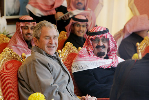 President George W. Bush joins Saudi King Abdullah bin Abd al-Aziz Al Saud, right, at a viewing of the King's prized horses Tuesday, Jan. 15, 2008 at the monarch's ranch in Al Janadriyah, Saudi Arabia. White House photo by Eric Draper