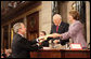 President George W. Bush delivers copies of his speech to Speaker of the House Nancy Pelosi (D-California) and Vice President Dick Cheney before delivering his 2008 State of the Union address Monday, Jan. 28, 2008, at the U.S. Capitol. White House photo by Eric Draper