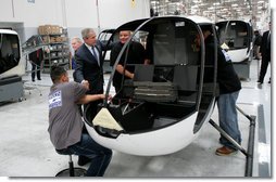 President George W. Bush meets with assembly workers on a tour of the Robinson Helicopter Company Wednesday, Jan. 30, 2008 in Torrance, Calif. President Bush later addressed employees and members of the media speaking in support of the propose economic stimulus package and the importance of free trade agreements for the nation’s economy. White House photo by Eric Draper