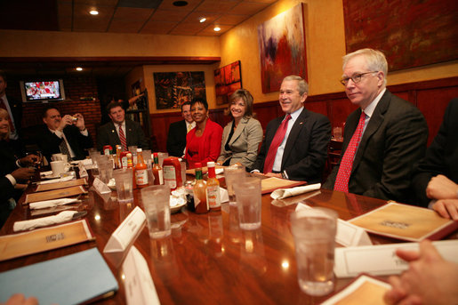 President George W. Bush meets with local business leaders at breakfast Friday, Feb. 1, 2008, in Kansas City, Mo. The President met the group before continuing on to Hallmark Cards, Inc., where he delivered a statement on the economy. White House photo by Eric Draper