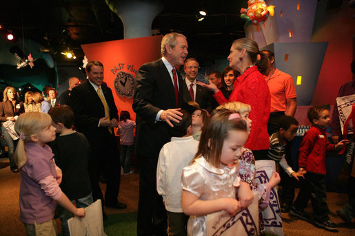 President George W. Bush is greeted upon arrival at Hallmark Cards, Inc., in Kansas City, Mo., Friday, Feb. 1, 2008, where he delivered a statement on the economy. White House photo by Eric Draper