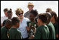 Mrs. Laura Bush visits with Florida City Elementary School students Wednesday, Feb. 6, 2008, during the Junior Ranger "First Bloom" planting event in Everglades National Park, Fla. President Bush on Monday asked Congress to spend $215 million for restoration of the Everglades. White House photo by Shealah Craighead