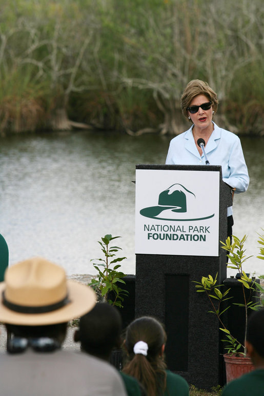 Mrs. Laura Bush addresses students and guests Wednesday, Feb. 6, 2008, during the Junior Ranger "First Bloom" planting event in Everglades National Park, Florida, praising a program to help bring back native trees in areas of the Everglades overgrown with non-native plants. White House photo by Shealah Craighead