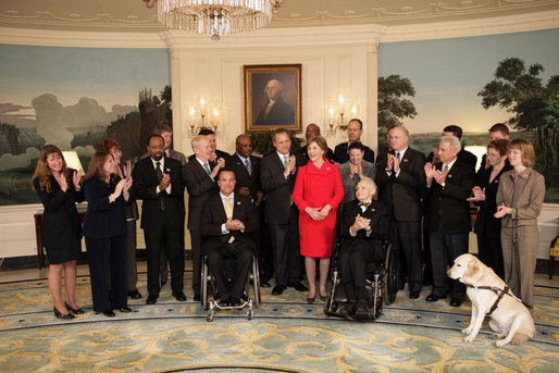 Mrs. Laura Bush participates in a photo opportunity with Jim Nussle, Director, Office of Management and Budget and employee of the year government workers from the AbilityOne 2007-2008 workforce Monday, Feb. 11, 2008, in the Diplomatic Room at the White House. White House photo by Shealah Craighead