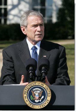 President George W. Bush talks with reporters Thursday, Feb. 14. 2008 on the South Lawn of the White House, urging members of Congress to pass the Protect America Act before legislation authorizing the monitoring of terrorist communications expires Saturday at midnight. White House photo by Chris Greenberg