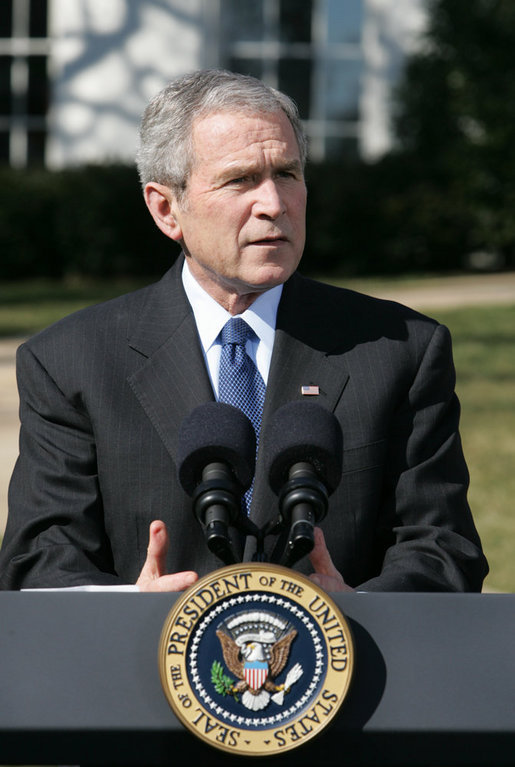 President George W. Bush talks with reporters Thursday, Feb. 14. 2008 on the South Lawn of the White House, urging members of Congress to pass the Protect America Act before legislation authorizing the monitoring of terrorist communications expires Saturday at midnight. White House photo by Chris Greenberg