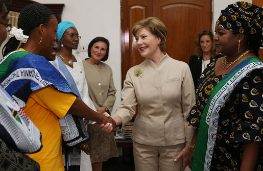 Mrs. Laura Bush is welcomed on her arrival to the WAMA Foundation Sunday, Feb. 17, 2008 in Dar es Salaam, Tanzania, for a meeting to launch the National Plan of Action for Orphans and Vulnerable Children. White House photo by Shealah Craighead