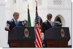 President George W. Bush delivers remarks as he participates in a joint press availability Sunday, Feb. 17, 2008, with President Jakaya Kikwete of Tanzania at the State House in Dar es Salaam. White House photo by Eric Draper