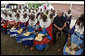 President George W. Bush visits with students and staff Monday, Feb. 18, 2008, at the Maasai Girls School in Arusha, Tanzania. White House photo by Eric Draper