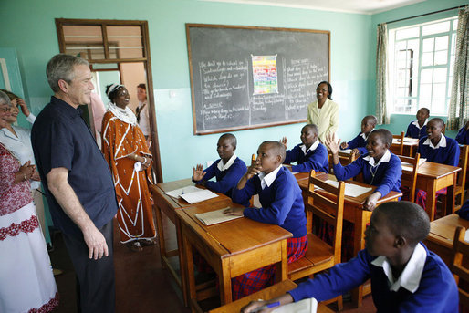 President George W. Bush visits with students in a classroom Monday, Feb. 18, 2008, at the Maasai Girls School in Arusha, Tanzania. White House photo by Eric Draper