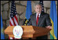 President George W. Bush addresses reporters during a joint press availability following the signing of a bilateral investment treaty with Rwanda President Paul Kagame, Tuesday, Feb. 19, 2008 in Kilgali, Rwanda. White House photo by Chris Greenberg