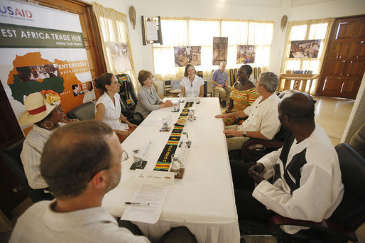 President George W. Bush and Mrs. Laura Bush attend a USAID organization meeting Wednesday, Feb. 20, 2008, prior to touring the International Trade Fair Center in Accra, Ghana. White House photo by Eric Draper