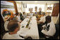 President George W. Bush and Mrs. Laura Bush attend a USAID organization meeting Wednesday, Feb. 20, 2008, prior to touring the International Trade Fair Center in Accra, Ghana. White House photo by Eric Draper