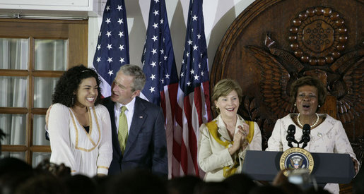 President George W. Bush congratulates singer Jordin Sparks after she sang the U.S. National Anthem Wednesday, Feb. 20, 2008, during the welcome for President Bush and Mrs. Laura Bush to the U.S. Ambassador's Residence in Accra, Ghana, by Ambassador Pamela Bridgewater. White House photo by Shealah Craighead