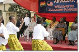 Mrs. Laura Bush watches a children's dance performance during welcome ceremonies Wednesday, Feb. 20, 2008, at the Maamobi Polyclinic health facility in Accra, Ghana. White House photo by Shealah Craighead