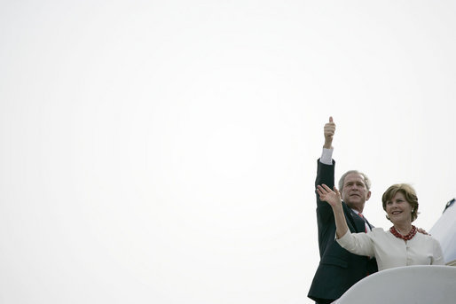 President George W. Bush and Mrs. Laura Bush wave to a crowd as they depart Monrovia, Liberia Thursday, February 21, 2008, concluding a six country, seven-day trip through Africa. White House photo by Shealah Craighead