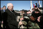 Vice President Dick Cheney shakes the outstretched hands of soldiers Tuesday, Feb. 26, 2008, following a rally for the troops at Fort Hood, Texas, home of the U.S. Army's First Cavalry Division. White House photo by David Bohrer