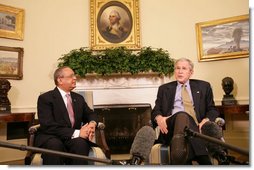 President George W. Bush meets with Sada Cumber, the first U.S. envoy to the Organization of the Islamic Conference Wednesday, Feb. 27, 2008, in the Oval Office. White House photo by Chris Greenberg