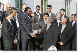 President Bush shakes hands with Boston Red Sox David Ortiz during a ceremony honoring the 2007 World Series Champion Boston Red Sox, Wednesday, Feb. 27, 2008, on the South Lawn of the White House. White House photo by Chris Greenberg