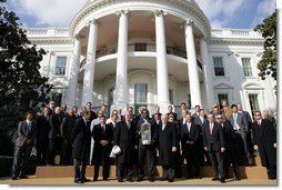 President George W. Bush and Vice President Dick Cheney stand with the 2007 World Series Champion Boston Red Sox Wednesday, Feb. 27, 2008, on the South Lawn of the White House. White House photo by Chris Greenberg