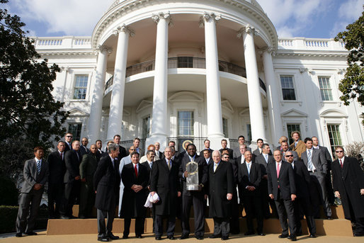 President George W. Bush and Vice President Dick Cheney stand with the 2007 World Series Champion Boston Red Sox Wednesday, Feb. 27, 2008, on the South Lawn of the White House. White House photo by Chris Greenberg