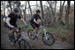 President George W. Bush and Prime Minister Anders Fogh Rasmussen of Denmark enjoy a bike ride at The Bush Ranch in Crawford, Texas, Friday, Feb. 29, 2008. White House photo by Eric Draper