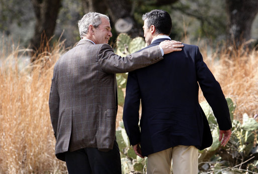 President George W. Bush and Prime Minister Anders Fogh Rasmussen of Denmark walk together at the conclusion of their press availability at The Bush Ranch in Crawford, Texas, Saturday, March 1, 2008, in Crawford, Texas. White House photo by Eric Draper