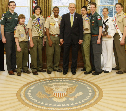 President George W. Bush welcomes Boy Scout representatives to the Oval Office Tuesday, March 4, 2008, as they presented him with their Report to the Nation, highlighting the 2007 accomplishments of the Boy Scouts of America. White House photo by Eric Draper