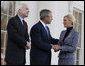 As her husband, Senator John McCain, looks on, President George W. Bush greets Cindy McCain after arriving Wednesday, March 5, 2008, at the White House, where the President offered his endorsement of the Republican presidential nominee. White House photo by Eric Draper