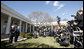 President George W. Bush and Arizona Senator John McCain stand in front of the media in the Rose Garden Wednesday, March 5, 2008. The President welcomed Senator McCain and his wife, Cindy, and offered his endorsement by saying, ". He's going to be the President who will bring determination to defeat an enemy, and a heart big enough to love those who hurt." White House photo by Eric Draper