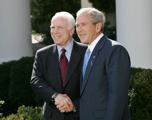 President George W. Bush and Senator John McCain (R-Ariz.) shake hands as they deliver a statement Wednesday, March 5, 2008, in the Rose Garden of the White House. Said the President in his endorsement of Senator McCain, "John showed incredible courage and strength of character and perseverance in order to get to this moment. And that's exactly what we need in a President." White House photo by Chris Greenberg