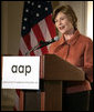 Mrs. Laura Bush addresses the 2008 Annual Meeting of the Association of American Publishers at the Yale Club in New York City Wednesday, March 5, 2008. Mrs. Bush told the group, "Thank you to each one of you for raising awareness about the benefits and the necessity of literacy. We owe our future to people like you, who appreciate and facilitate the wonders of a good book, who call attention to the immense blessings of reading, and who tap the resources of great writers and pour them into books for the rest of us to read." White House photo by Shealah Craighead