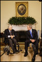 President George W. Bush welcomes Cpl. Frank Woodruff Buckles, the last known surviving American-born WWI veteran, to the Oval Office Thursday, March 6, 2008. The President told the 107-year-old, ".One way for me to honor the service of those who wear the uniform in the past and those who wear it today is to herald you, sir, and to thank you very much for your patriotism and your love for America." White House photo by Eric Draper