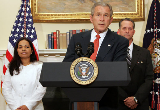 President George W. Bush is joined by Cuban political activists Miguel Sigler Amaya and his wife, Josefa Lopez Pena as he delivers a statement Friday, March 7, 2008, on the state of Cuba. Said the President, "As I told the Cuban people last October, a new day for Cuba will come. Until that day comes, the United States will continue to shine a bright and revealing light on Cuba's abuses. We will continue to tell the stories of Cuba's people, even when a lot of the world doesn't want to hear them. And we will carry this refrain in our hearts: Viva Cuba Libre." White House photo by Chris Greenberg