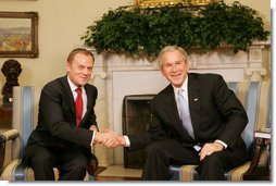 President George W. Bush welcomes Poland’s Prime Minister Donald Tusk to the Oval Office of the White House, Monday, March 10, 2008.  White House photo by Joyce N. Boghosian