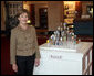 Mrs. Laura Bush poses with the 2008 State Easter Egg Display Monday, March 10, 2008, at the White House Visitors Center in Washington, D.C. The State Egg Display tradition has been going on since 1994, and is coordinated by the American Egg Board who selects an artist from each state to paint/decorate an egg. White House photo by Shealah Craighead