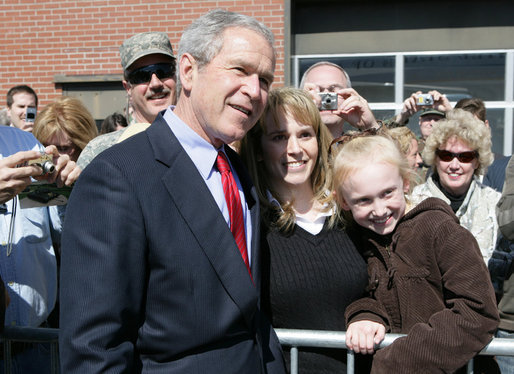 President George W. Bush poses for photos on his departure Tuesday, March 11, 2008 from Nashville, Tenn., following his address to the National Religious Broadcasters convention. White House photo by Chris Greenberg