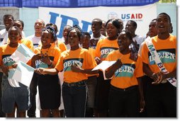 A choir sings a welcome song for Mrs. Laura Bush during her visit to the IDEJEN educational program at the College de St. Martin Tours Thursday, March 13, 2008, in Port-au-Prince, Haiti.  White House photo by Shealah Craighead