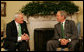 President George W. Bush welcomes Prime Minister Bertie Ahern of Ireland to the White House Monday, March 17, 2008, in celebration of St. Patrick's Day. White House photo by Joyce N. Boghosian