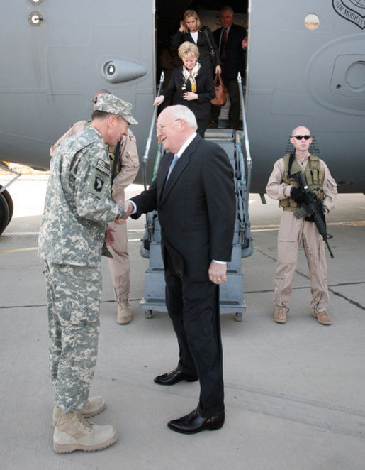 Vice President Dick Cheney is greeted by General David Petraeus, Commanding General of Multi-National Forces Iraq, as his wife Mrs. Lynne Cheney and daughter Liz Cheney deplanes in Baghdad, Monday, March 17, 2008. The visit is the Vice President's third to Iraq and comes during the fifth anniversary of the beginning of the U.S.-led campaign to liberate the Iraqi people. White House photo by David Bohrer