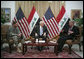 Vice President Dick Cheney participates in a classified briefing with U.S. Ambassador to Iraq Ryan Crocker, left, and Commanding General of Multi-National Forces Iraq General David Petraeus, right, in the Green Zone in Baghdad. Later in the day the Vice President ventured outside the Green Zone to meet with Iraqi leadership to discuss energy legislation, long-term security issues and the development of Iraqi diplomatic relationships with neighboring countries. White House photo by David Bohrer