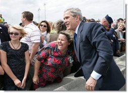 President George W. Bush poses for a photo with a port worker at the Blount Island Marine Terminal Tuesday, March 18, 2008, in Jacksonville, Fla. White House photo by Chris Greenberg