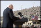 Vice President Dick Cheney delivers remarks Tuesday, March 18, 2008 to U.S. troops during a rally at Balad Air Base, Iraq. "During this deployment, ladies and gentlemen, you've seen incredible progress on the ground in Iraq -- not just as witnesses, but as participants," said the Vice President, adding, "The President and I, and your fellow citizens, want nothing more than have you and all of your comrades return home safely at the end of this tour of duty. We're going to do everything we can to make that happen." White House photo by David Bohrer