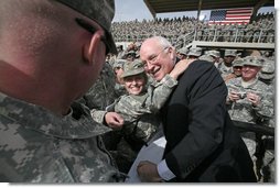 Vice President Dick Cheney greets U.S. troops and poses for pictures Tuesday, March 18, 2008, during a rally at Balad Air Base, Iraq. White House photo by David Bohrer