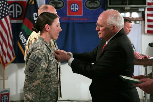 Vice President Dick Cheney awards the Silver Star Medal to Army Specialist Monica Brown of Lake Jackson, Texas Thursday, March 20, 2008, following a dinner with U.S. troops at Bagram Air Base, Afghanistan. While serving as a combat medic in April of 2007, Spc. Brown, 19, showed extraordinary heroism when she used her body to shield wounded soldiers from enemy gunfire and mortar shelling, then moving them to safety after their convoy came under attack in Afghanistan’s eastern Paktia province. She is the second woman since World War II to receive the Silver Star. White House photo by David Bohrer