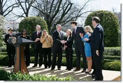 President George W. Bush thanks the council members from the President's Council on Physical Fitness and Sports following his announcement of the National President's Challenge Thursday, March 20, 2008 in the East Garden at the White House. The National President's Challenge is a six-week physical activity challenge beginning March 20th designed to get America up and moving 30 minutes a day, five days a week. White House photo by Chris Greenberg