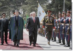 Vice President Dick Cheney, accompanied by President Hamid Karzai of Afghanistan, reviews an honor guard upon his arrival to Kabul Thursday, March 20, 2008. The Vice President's visit to Afghanistan is the third stop on a 10-day trip to the Middle East and Turkey. White House photo by David Bohrer