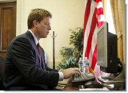 Hall of Fame football player Troy Aikman answered questions for "Ask the White House," Monday, March 24, 2008, after reading to children at the 2008 White House Easter Egg Roll. White House photo by Grant Miller