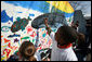 Kids paint a large mural of an ocean scene at the White House Easter Egg Roll Monday, Mar. 24, 2008 on the South Lawn of the White House. The theme for the 2008 Easter Egg Roll is Ocean Conservation. The kids were able to learn how to keep our oceans clean and healthy for fish and other ocean life. White House photo by Joyce N. Boghosian